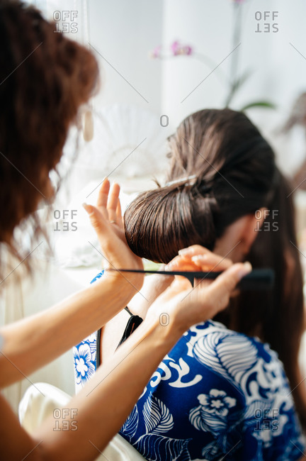 Woman having her hair done for a special occasion