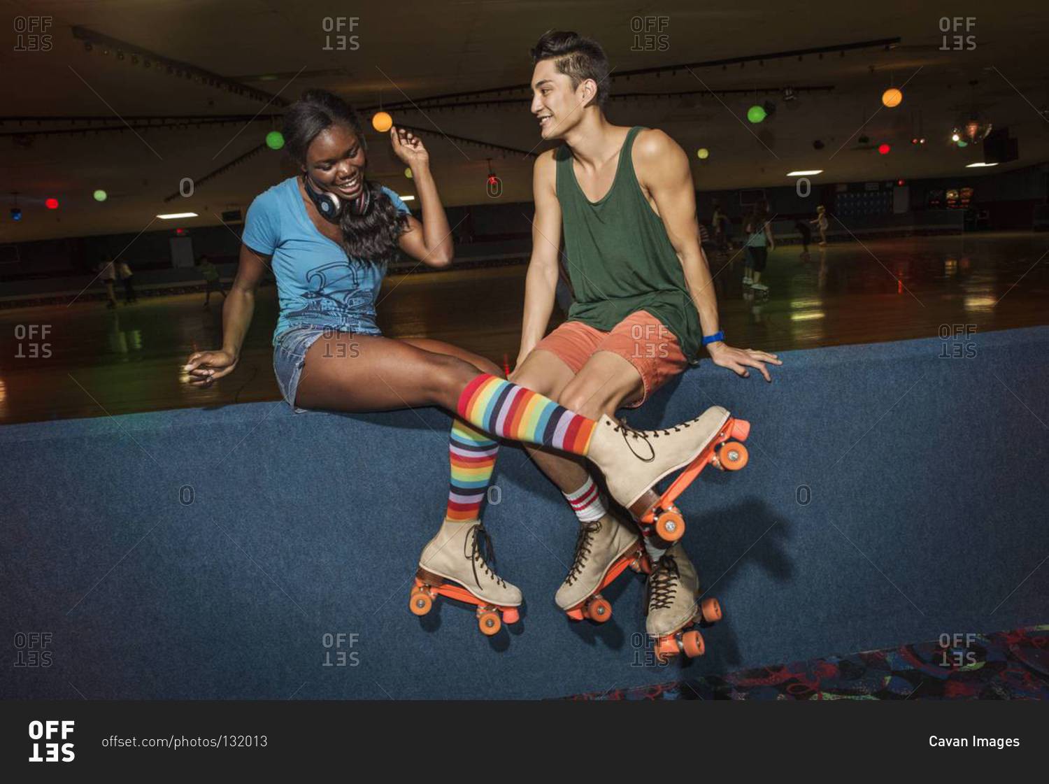 Young people having fun at a roller skate rink