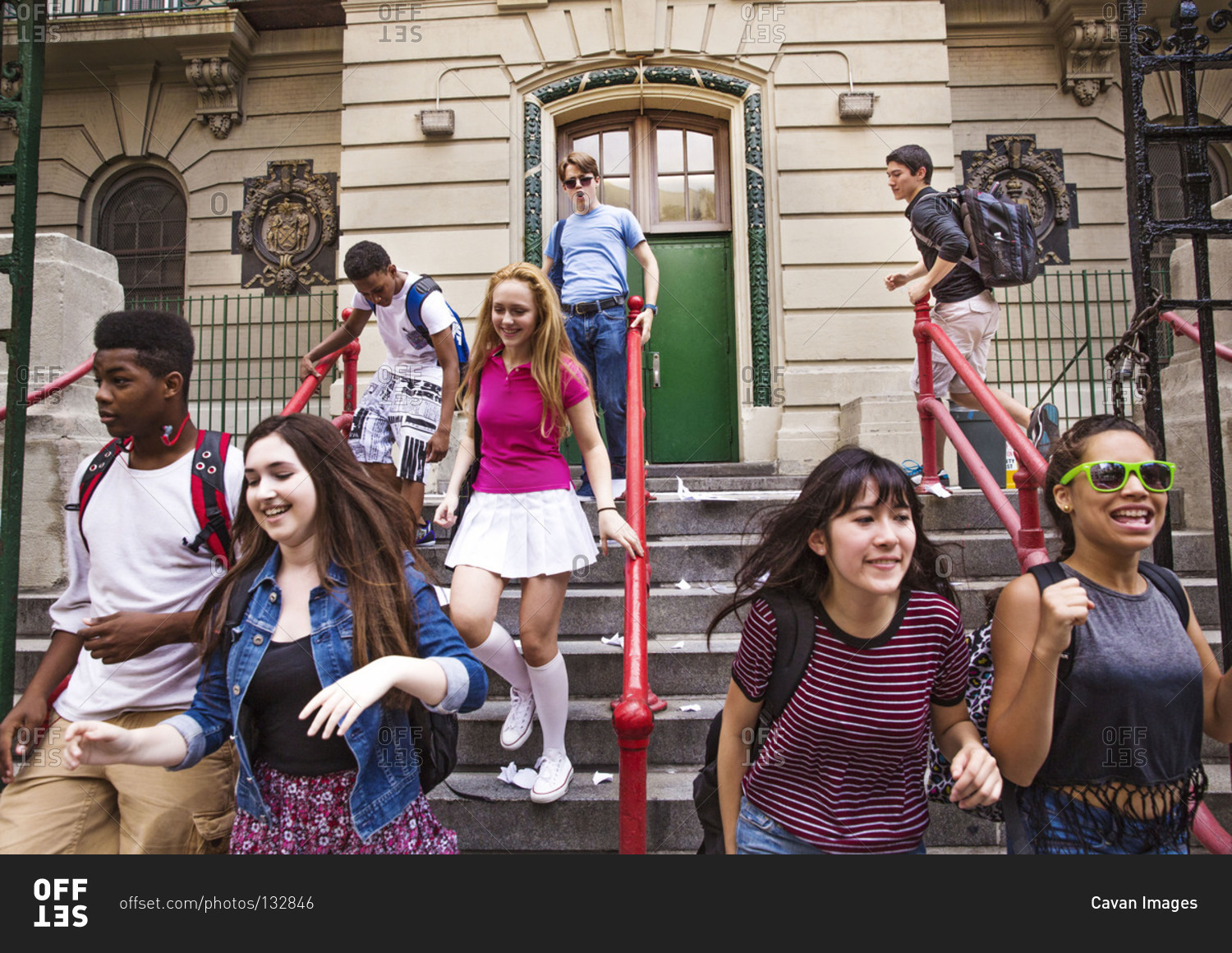 teenagers-coming-out-of-a-school-stock-photo-offset