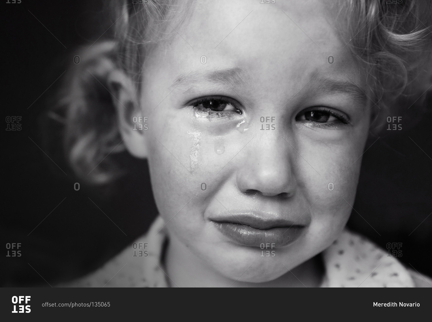 Headshot of a crying girl