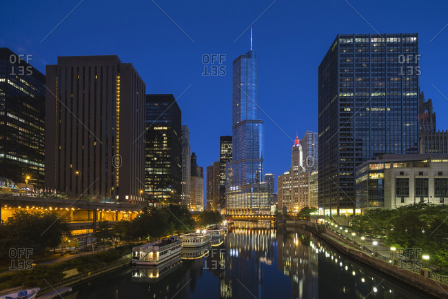 Trump Tower at Chicago River in the evening