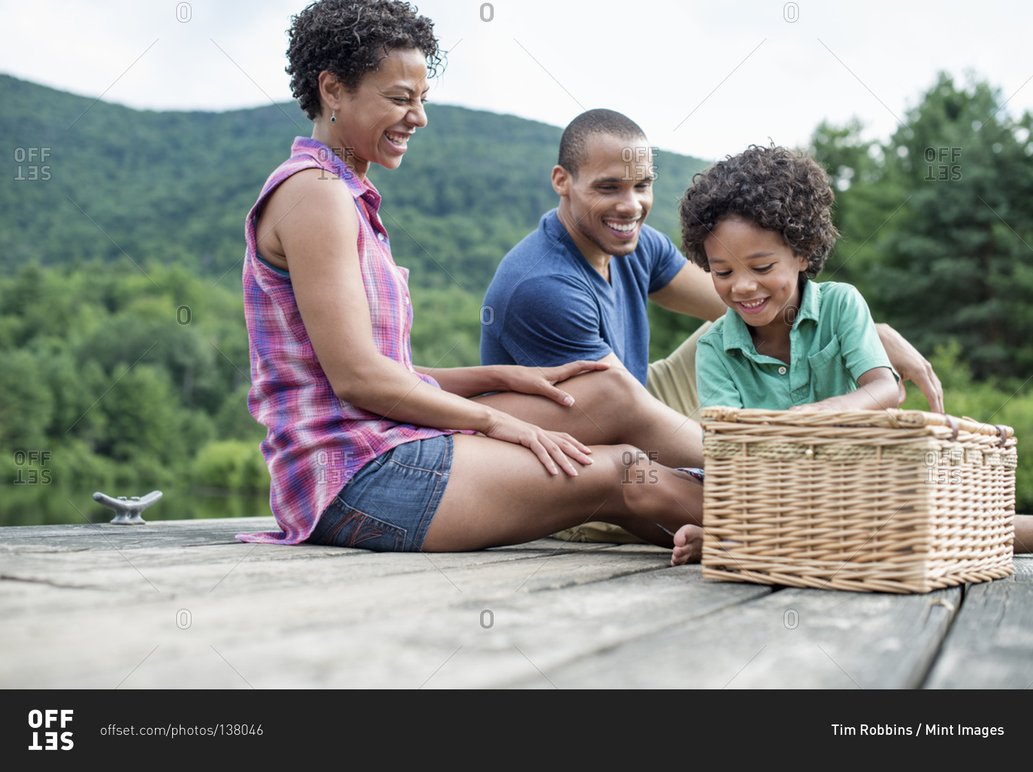 A family having a summer picnic at a lake