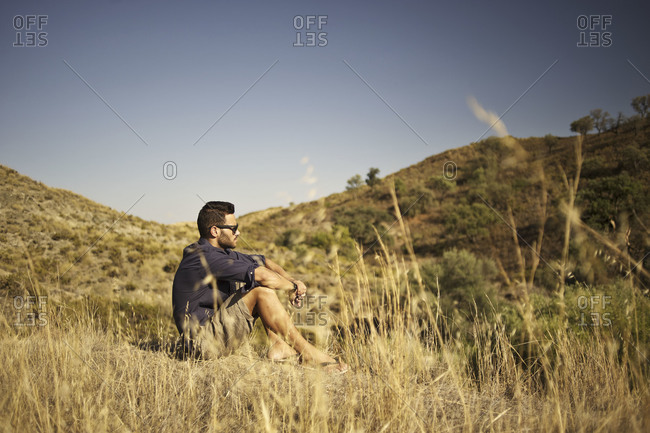 Man sitting in the hills