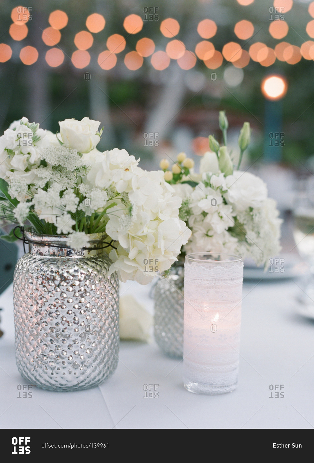 White flower bouquets at a wedding reception