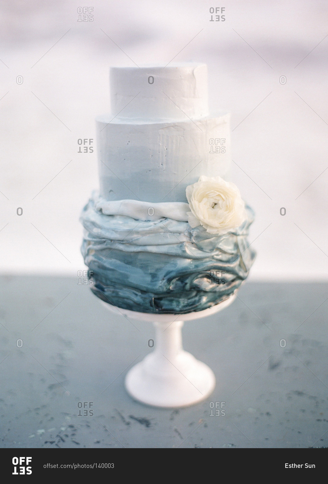 Cake decorated with a white flower