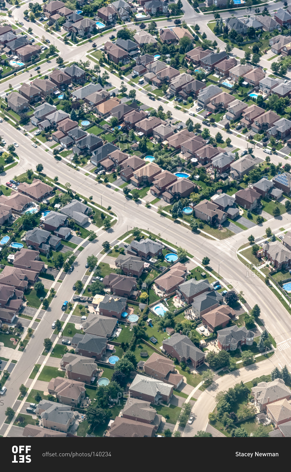 An aerial view of a crowded, upscale subdivision