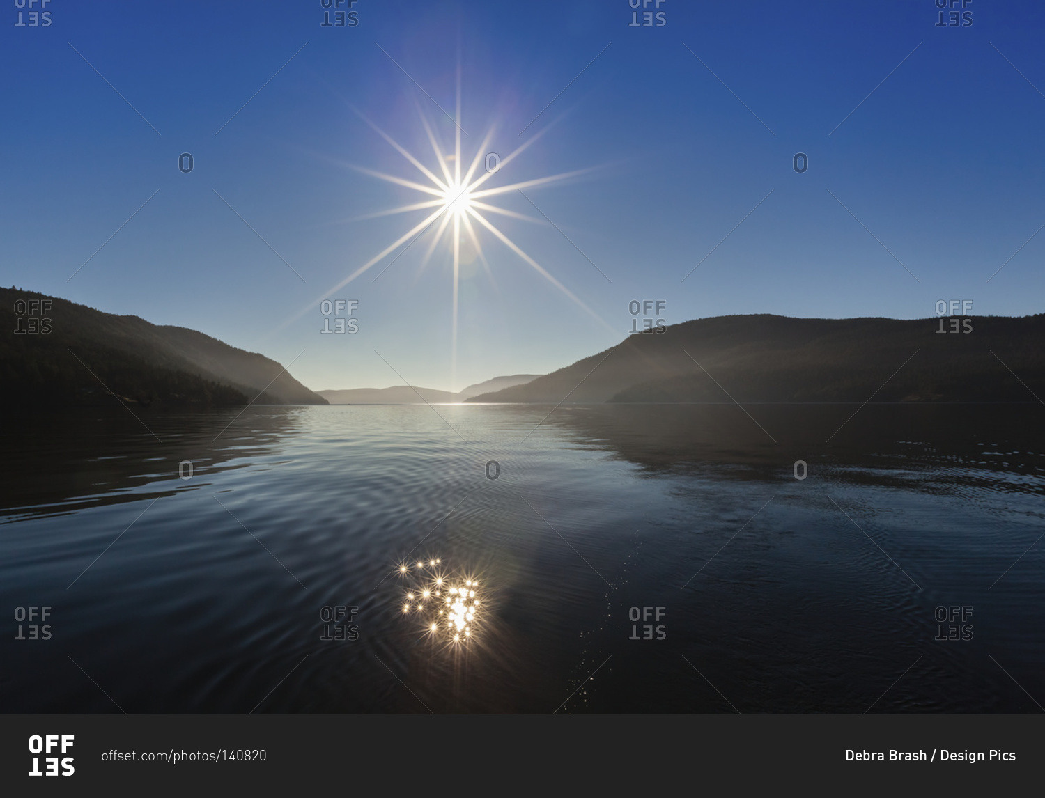 The sun rises over Sansum Narrows on Vancouver Island, Duncan, British Columbia,