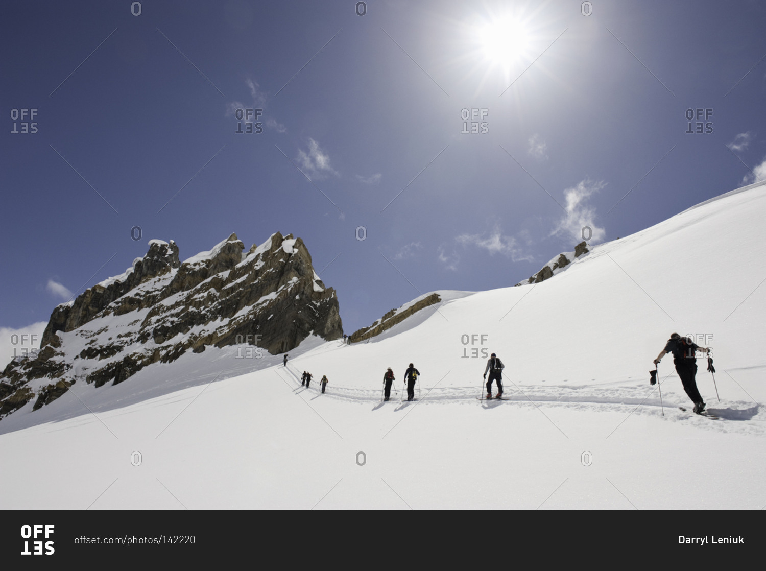 Low angle view of people cross-country skiing