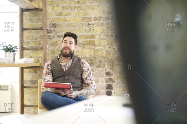 A man talking in an office
