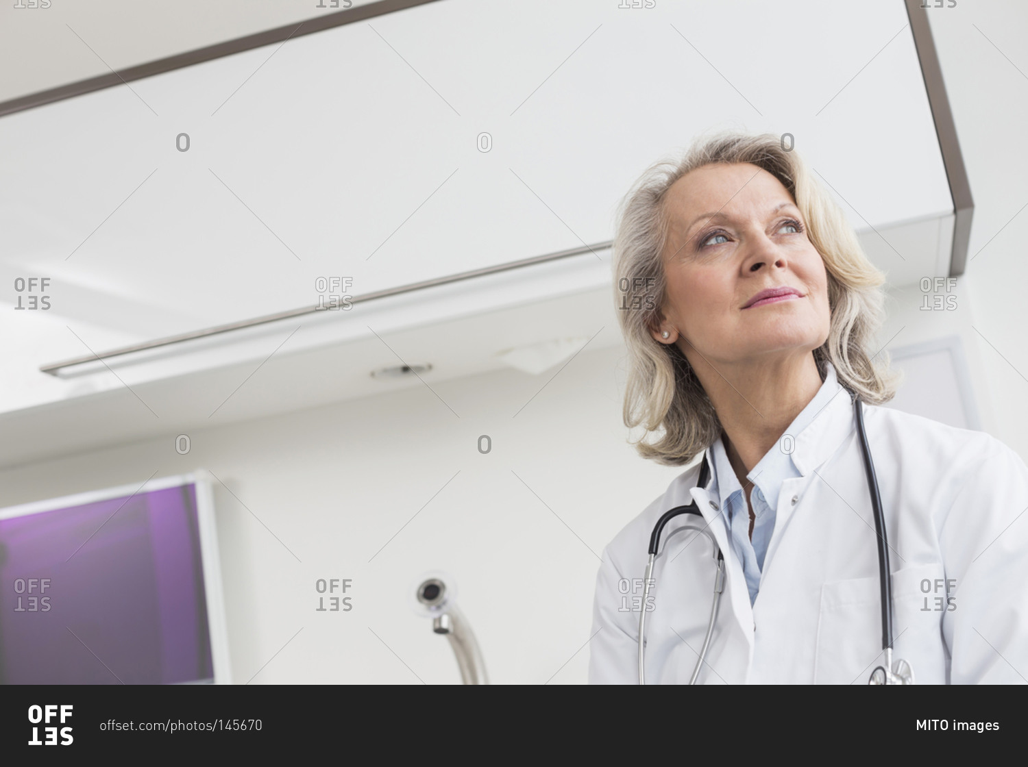 Portrait of senior doctor