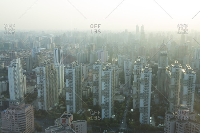 Buildings spread across an expansive city landscape