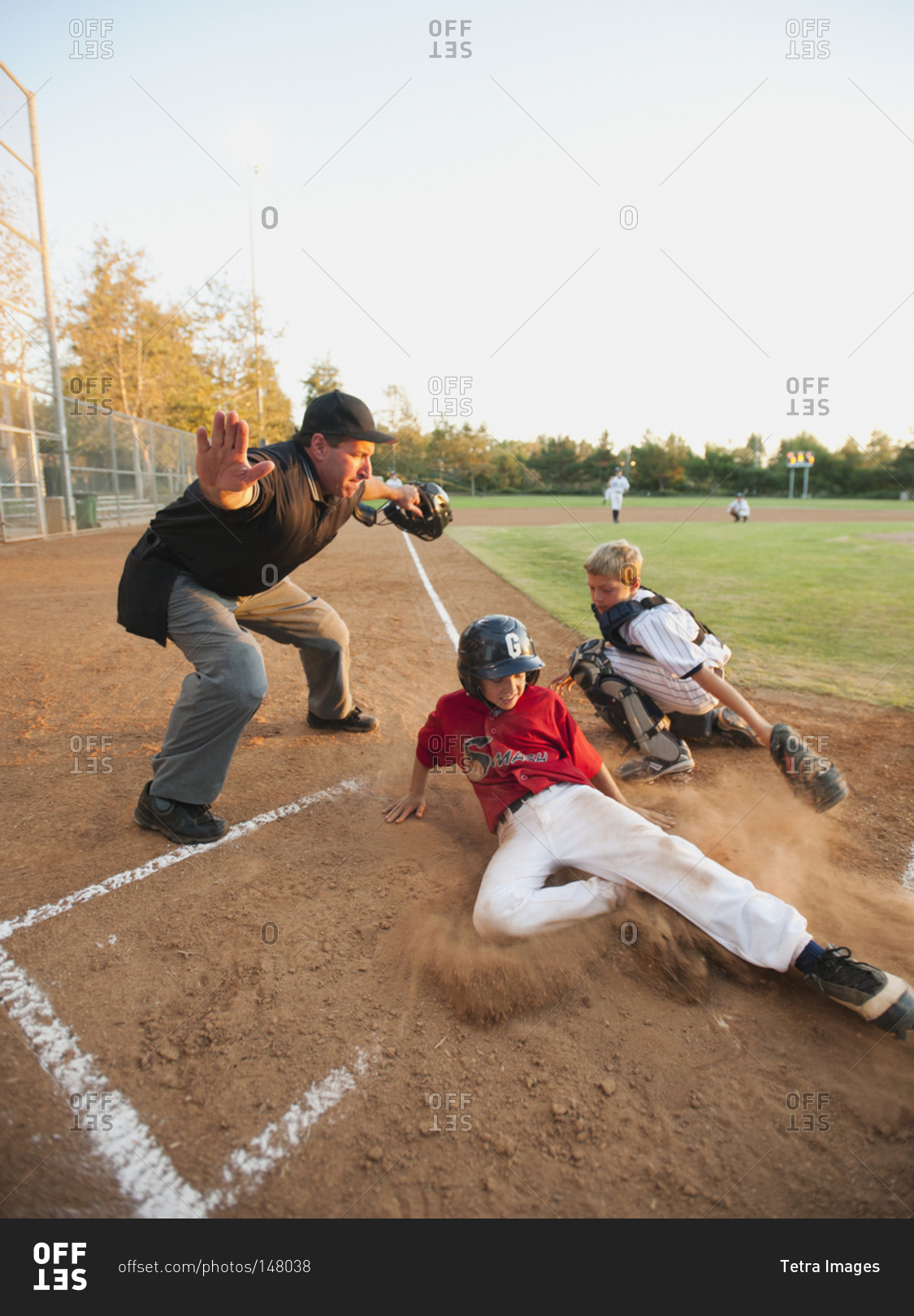 Boys (10-11) playing baseball
