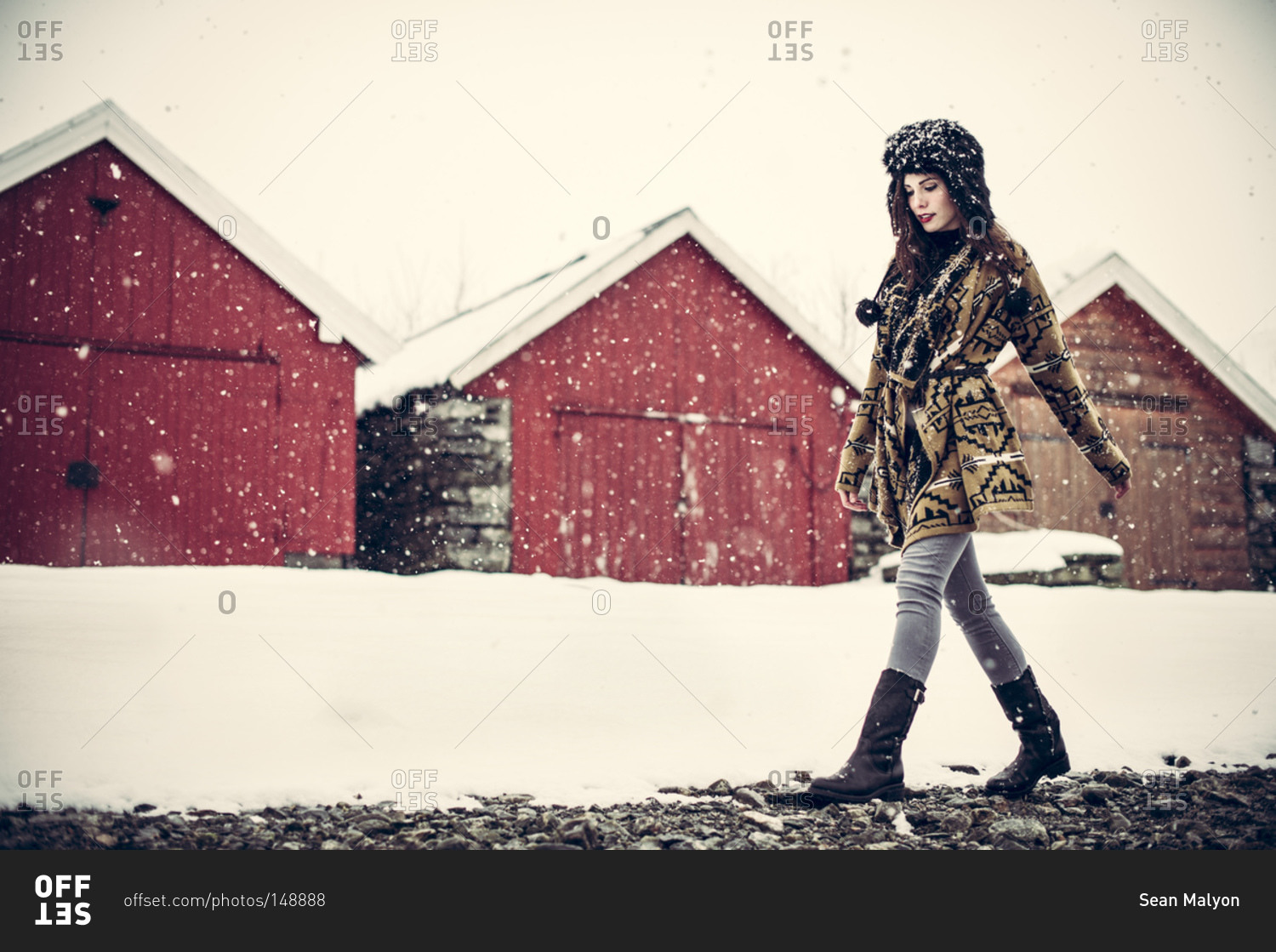 Woman walking in the snow in Norway