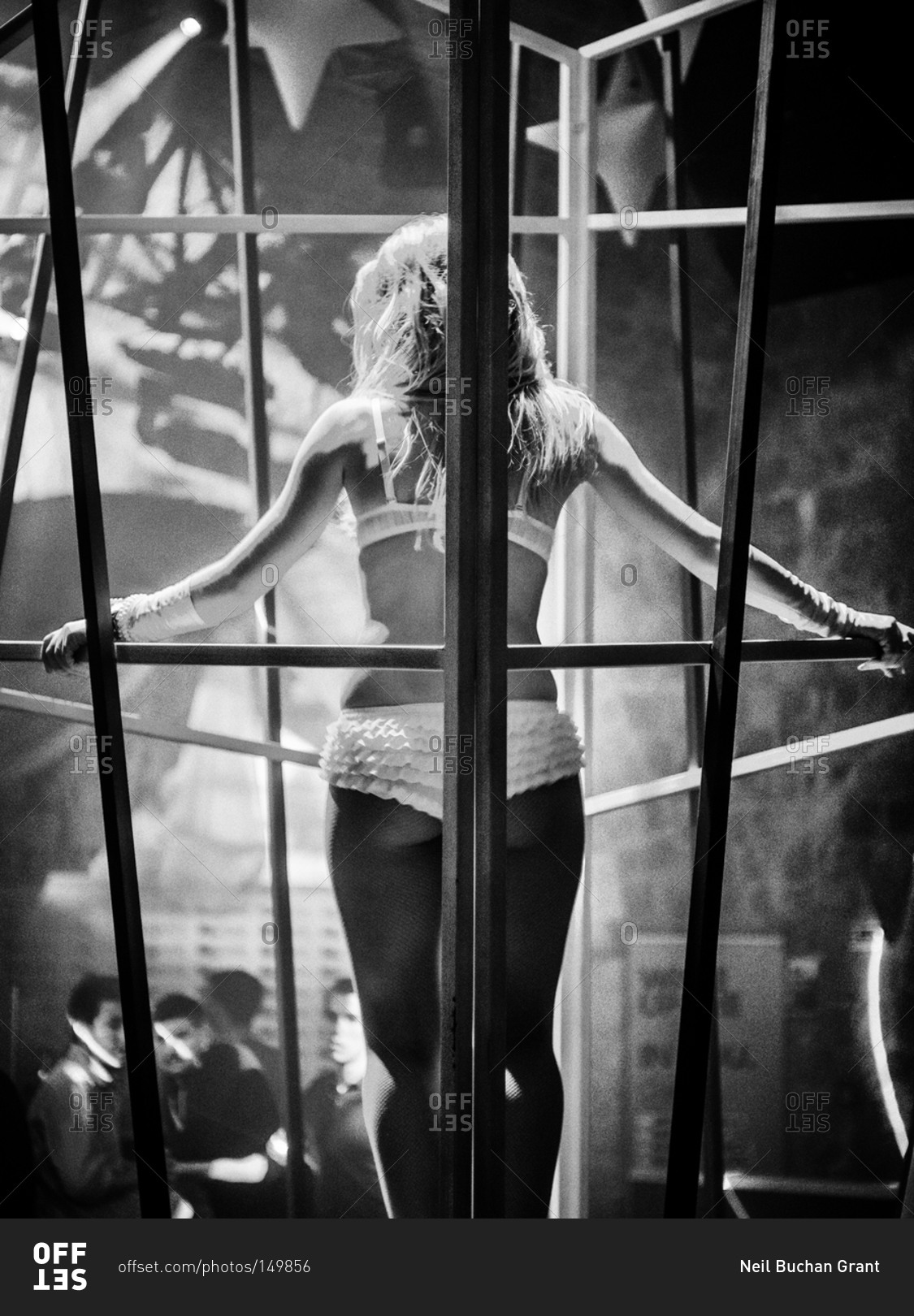 Cage dancer in a night club