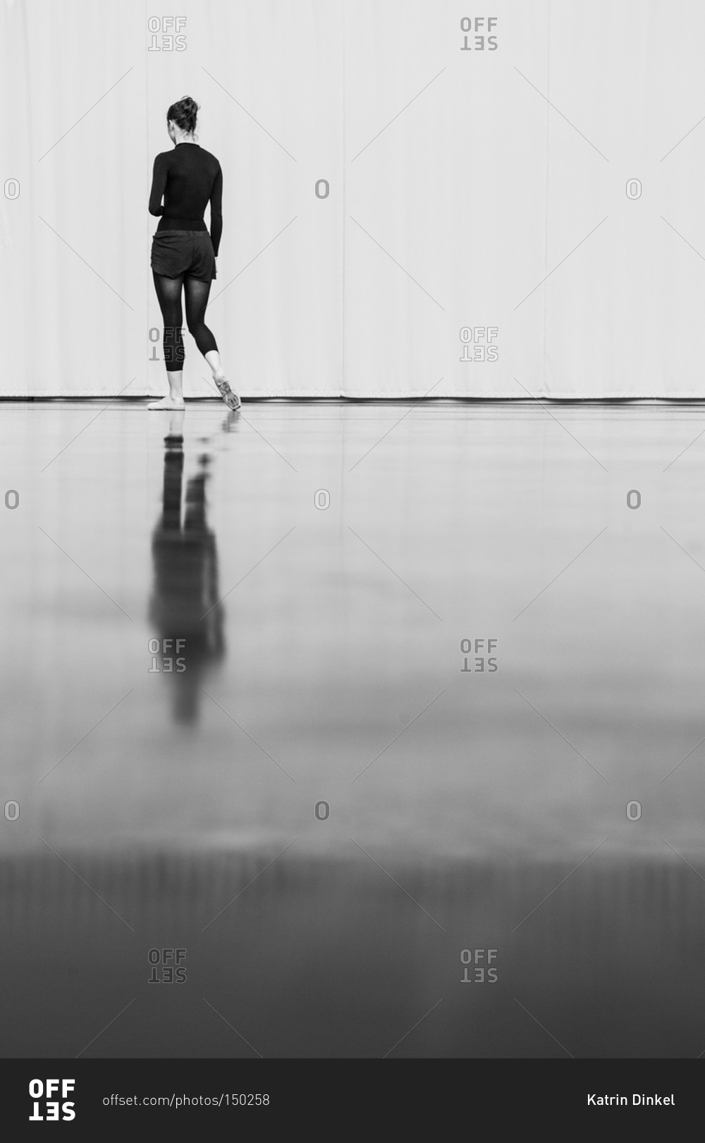 a-dancer-walks-to-the-far-end-of-a-dance-studio-stock-photo-offset