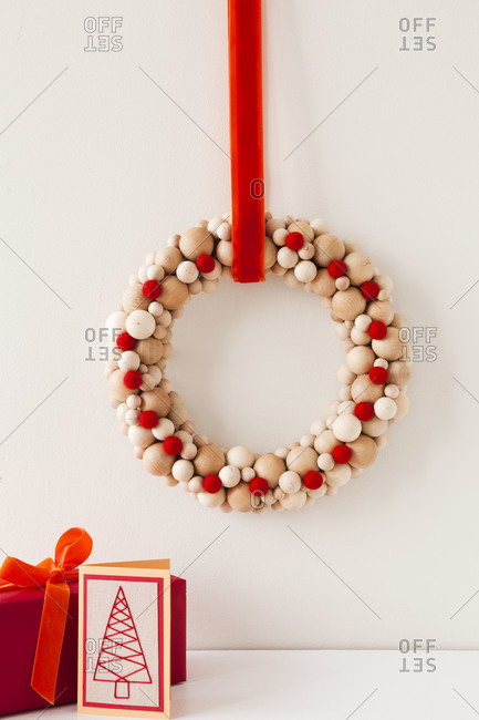 Christmas wreath with gifts and a card