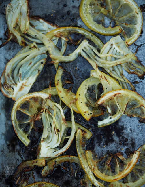 Onions and lemon rinds on a tray
