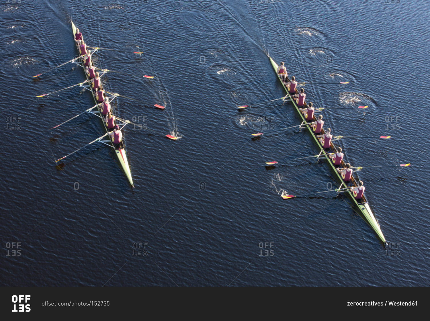 Above view of two rowing eights in water