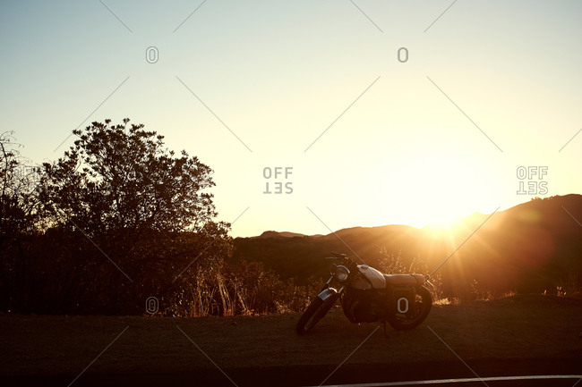 View of a motorcycle at sunset