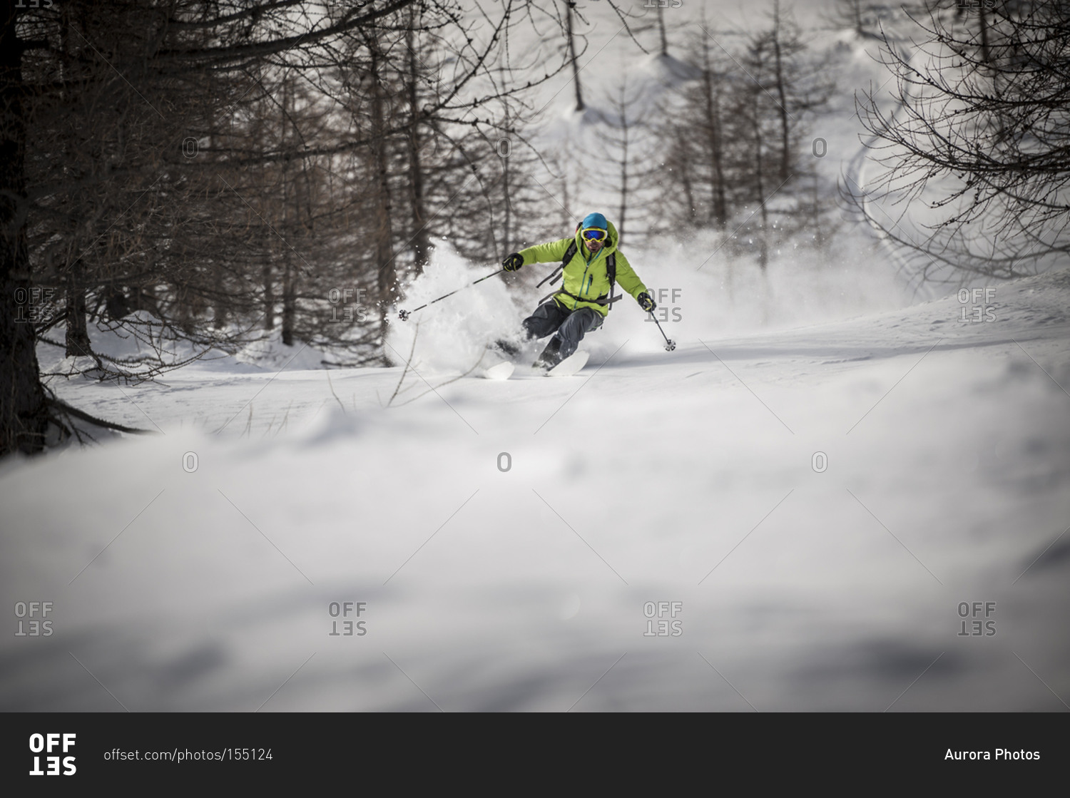 A backcountry skier descends a steep slope in Devero, Ossola, Italy
