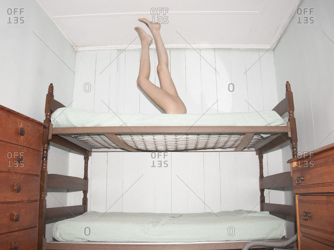 Pair Of Legs Stretching Out From, Offset Bunk Beds