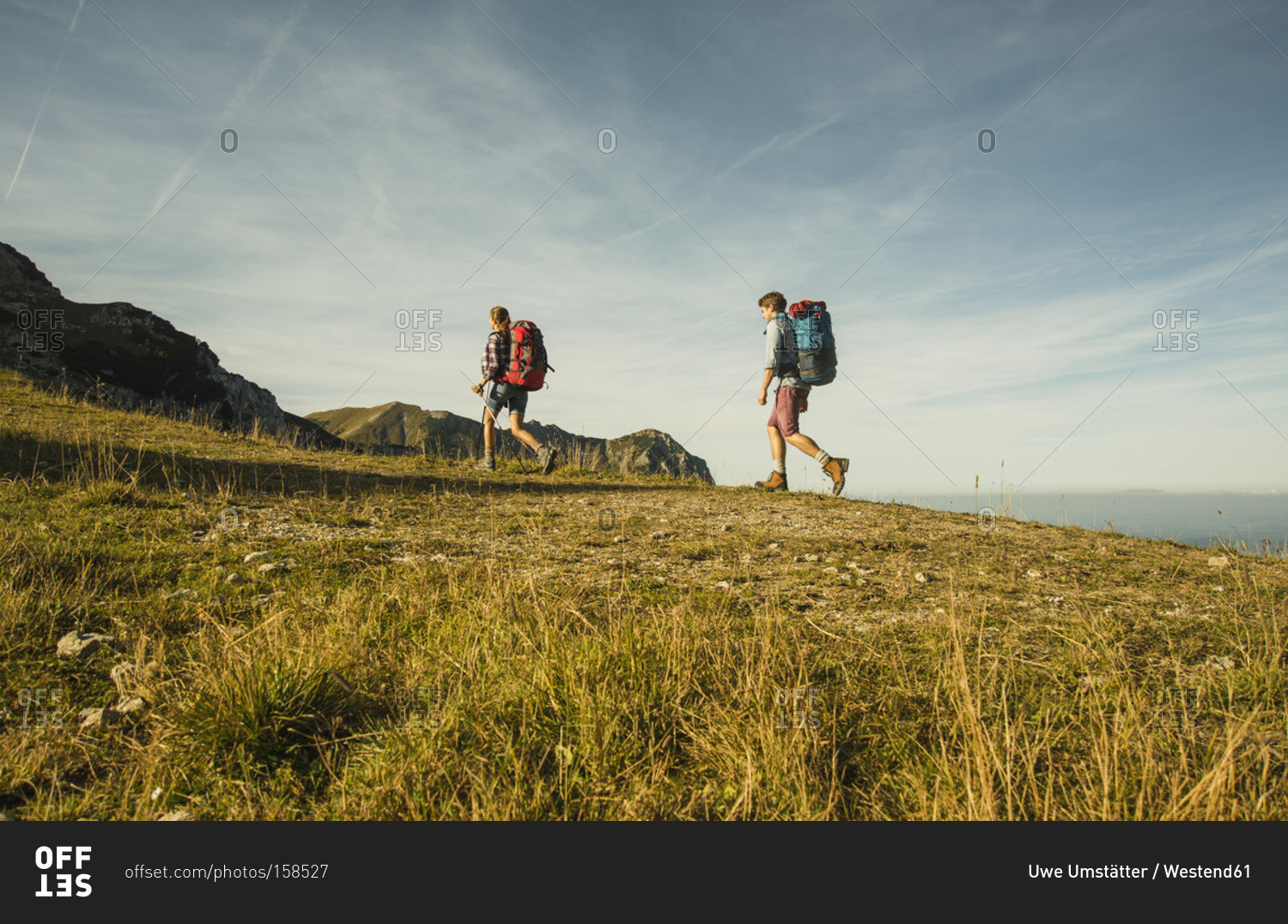 Young couple hiking, Tannheimer Tal,