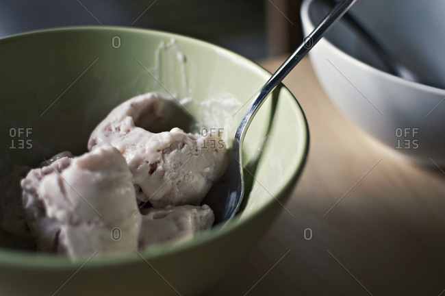 Half-eaten bowl of ice cream