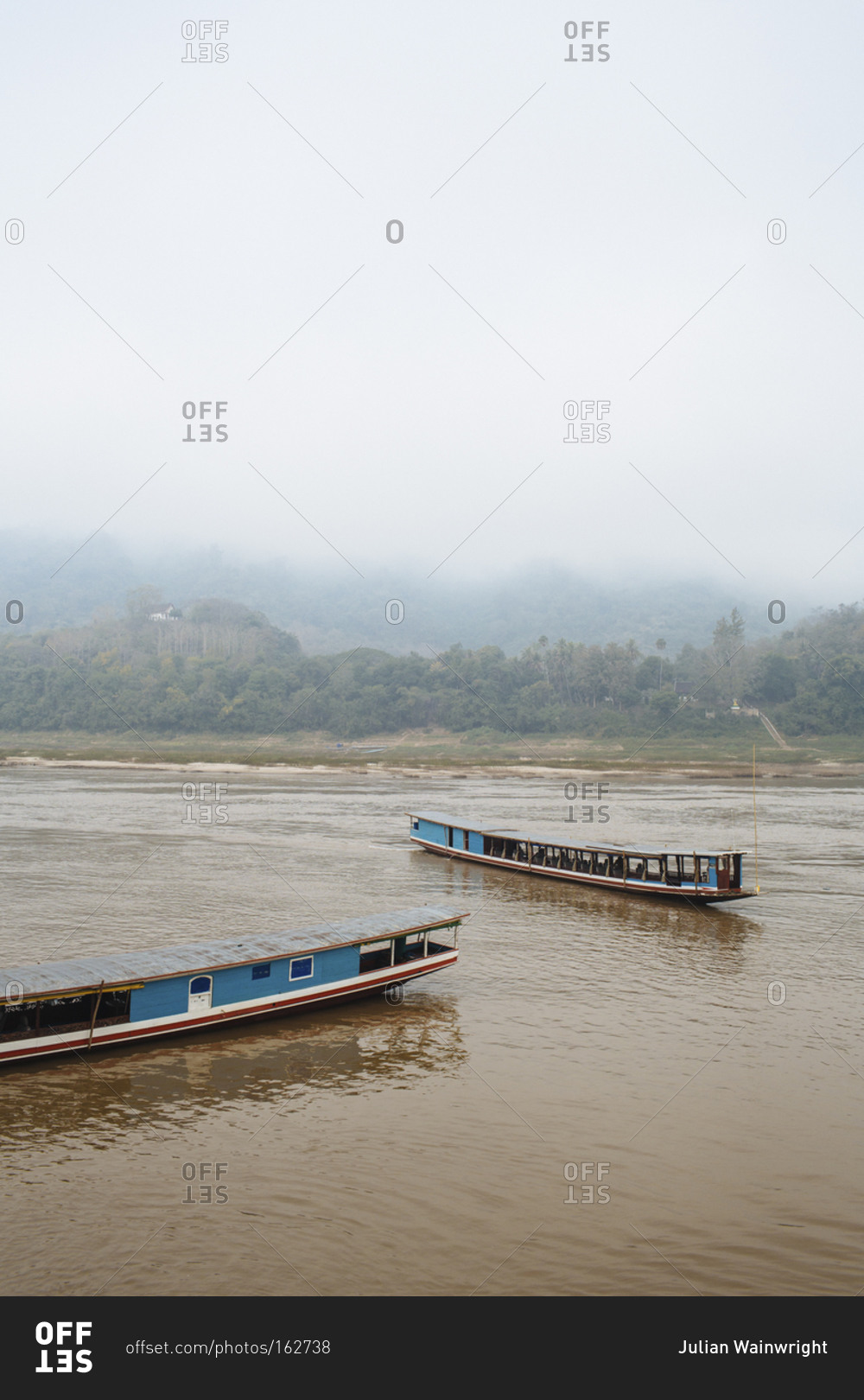 Slow boats on Mekong River in Laos