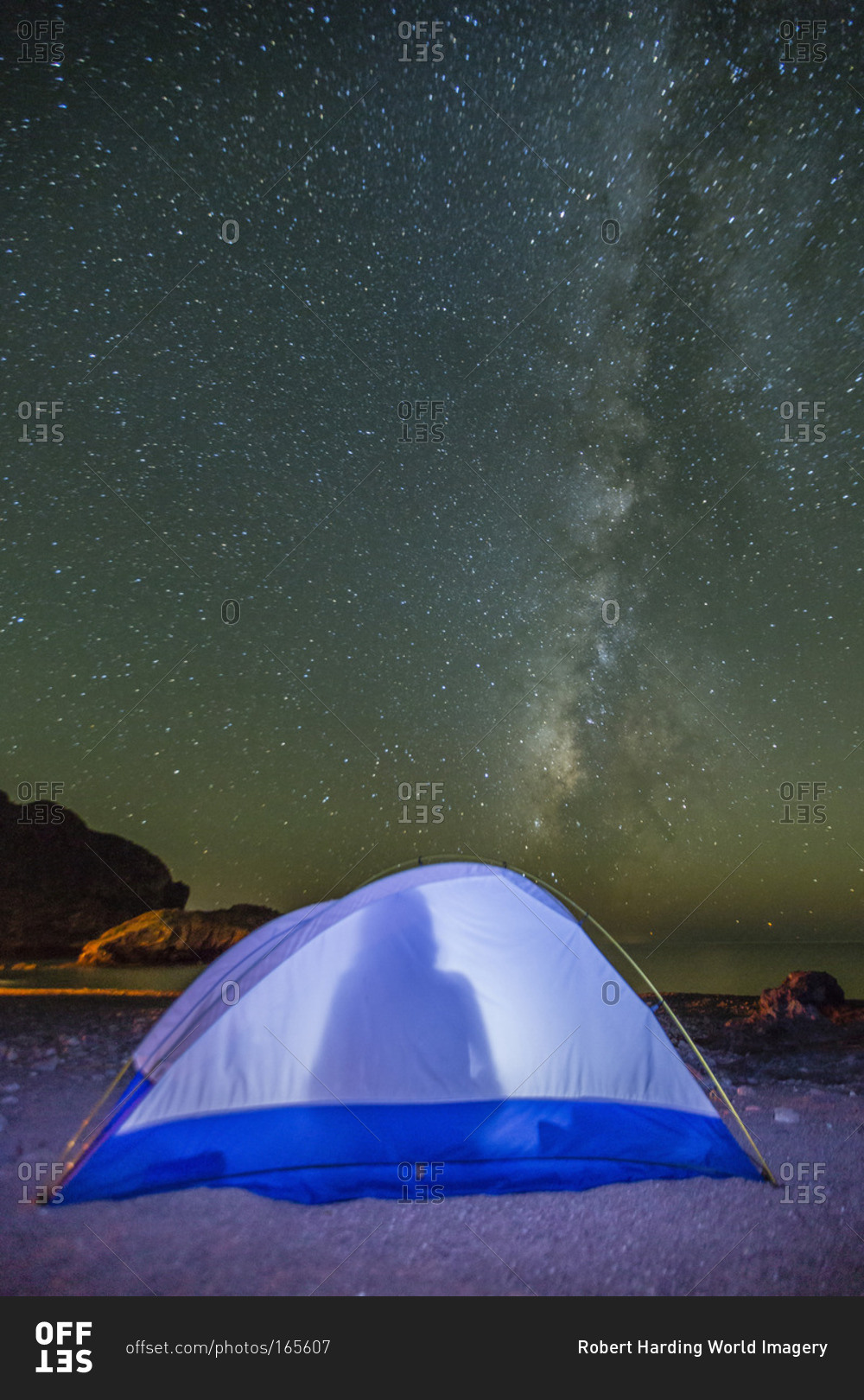 Night view of the Milky Way with lit up tent in foreground, Himalaya Beach, Sonora, Mexico, North America