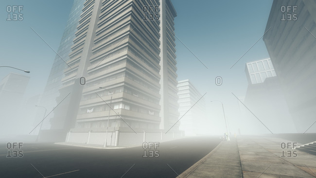 Desolate skyscraper city in the mist with blue sky