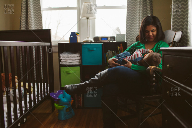 breastfeeding chair stock photos - OFFSET