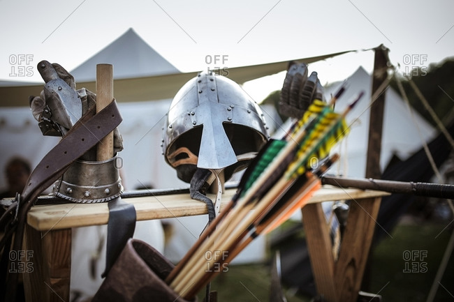 Weapons and helmet on a medieval fair