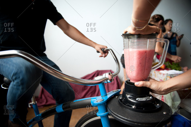 Making smoothies with a bicycle-powered blender