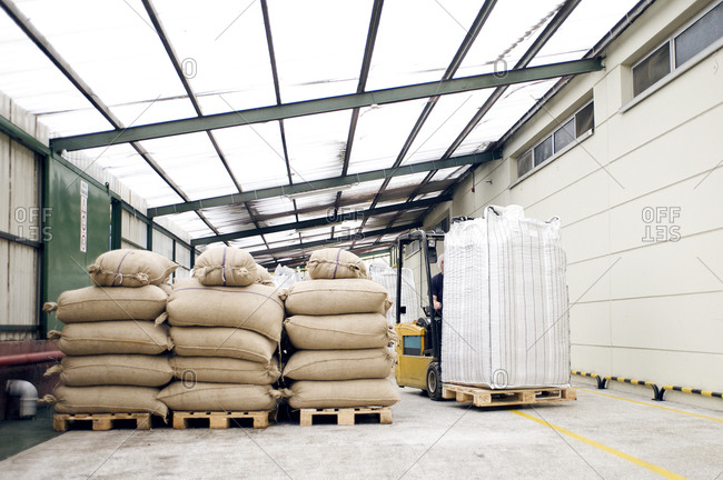Sacks on pallets in factory