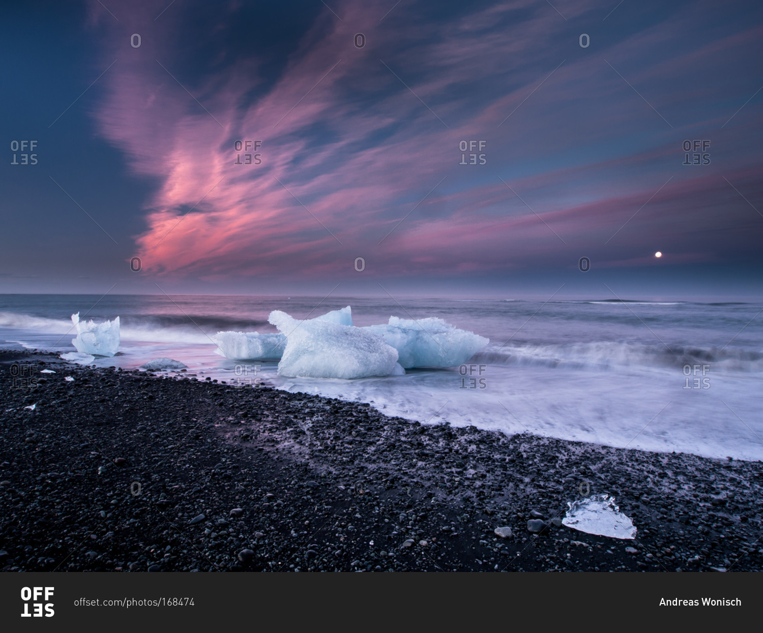 Sunset on Black Beach with Icebergs