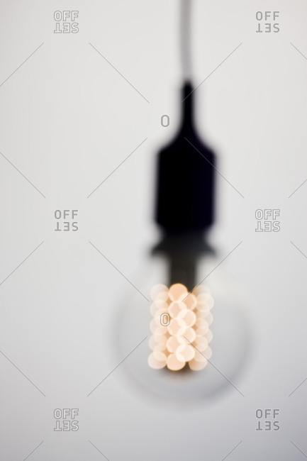 Defocused illuminated light bulb - Offset