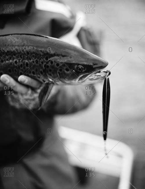 Man holding a caught trout