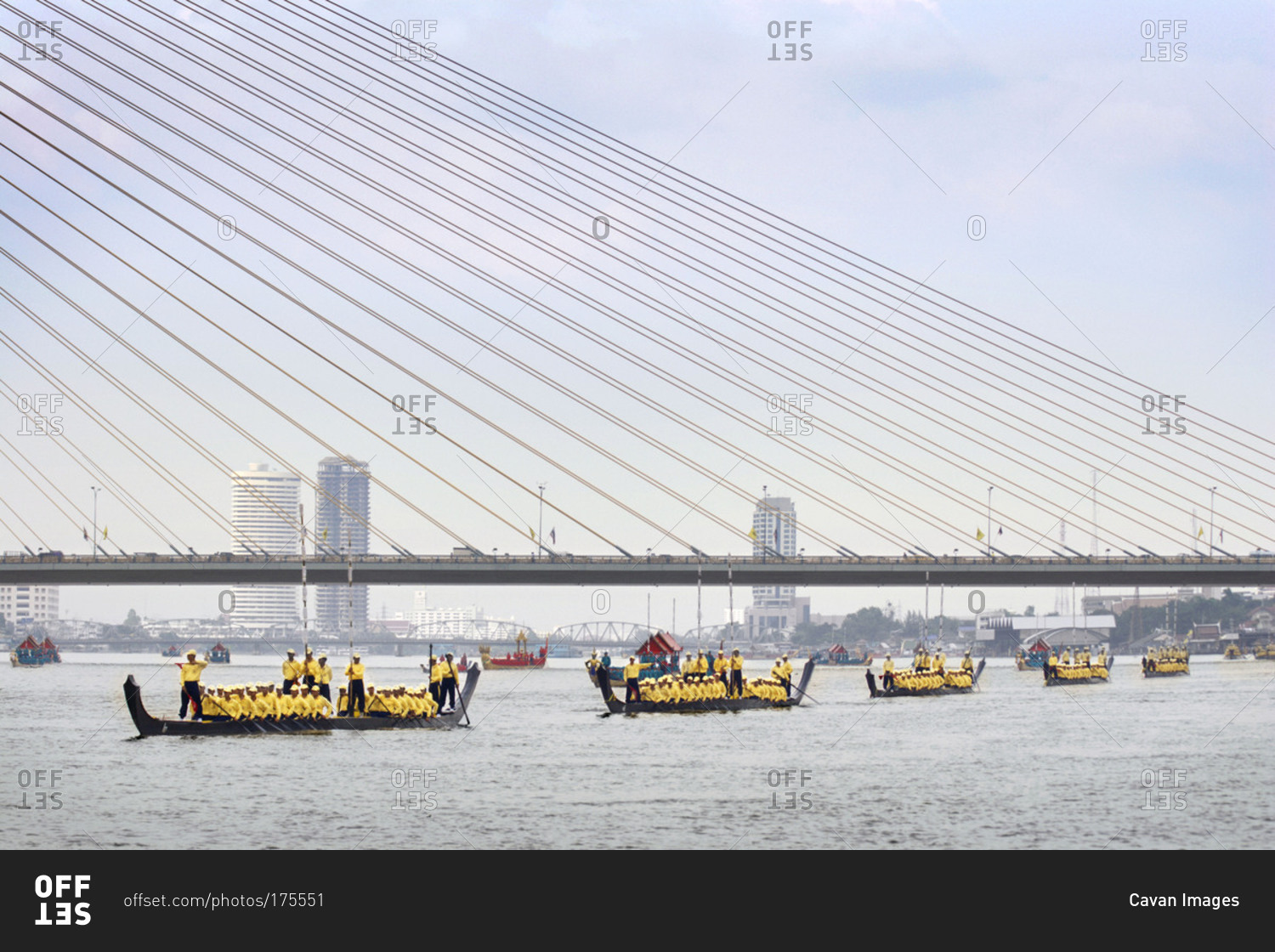 Boats traveling under Rama VIII bridge