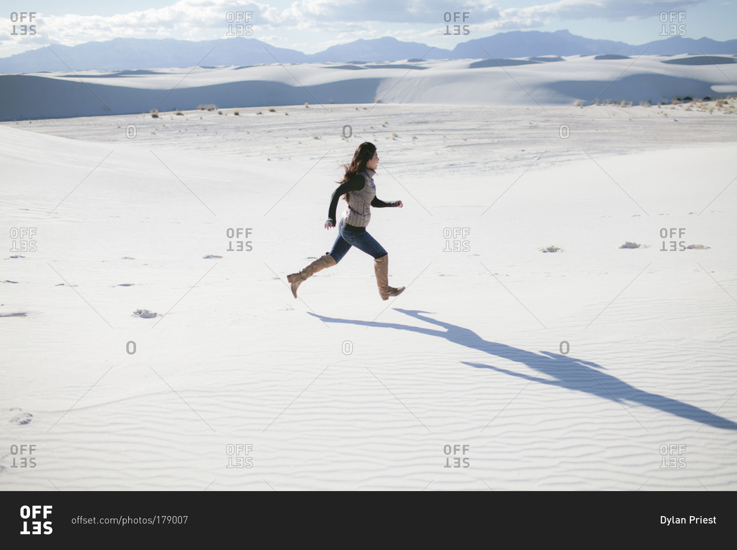 Woman running in White Sands National Monument