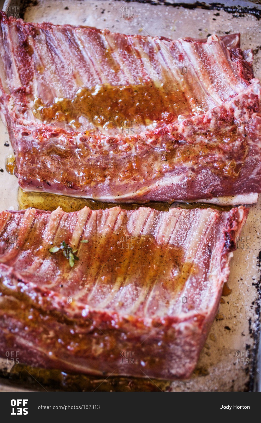 Wild boar ribs drizzled with olive oil