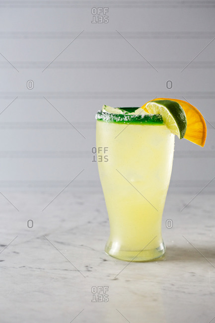 Citrus cocktail in a salt-rimmed glass