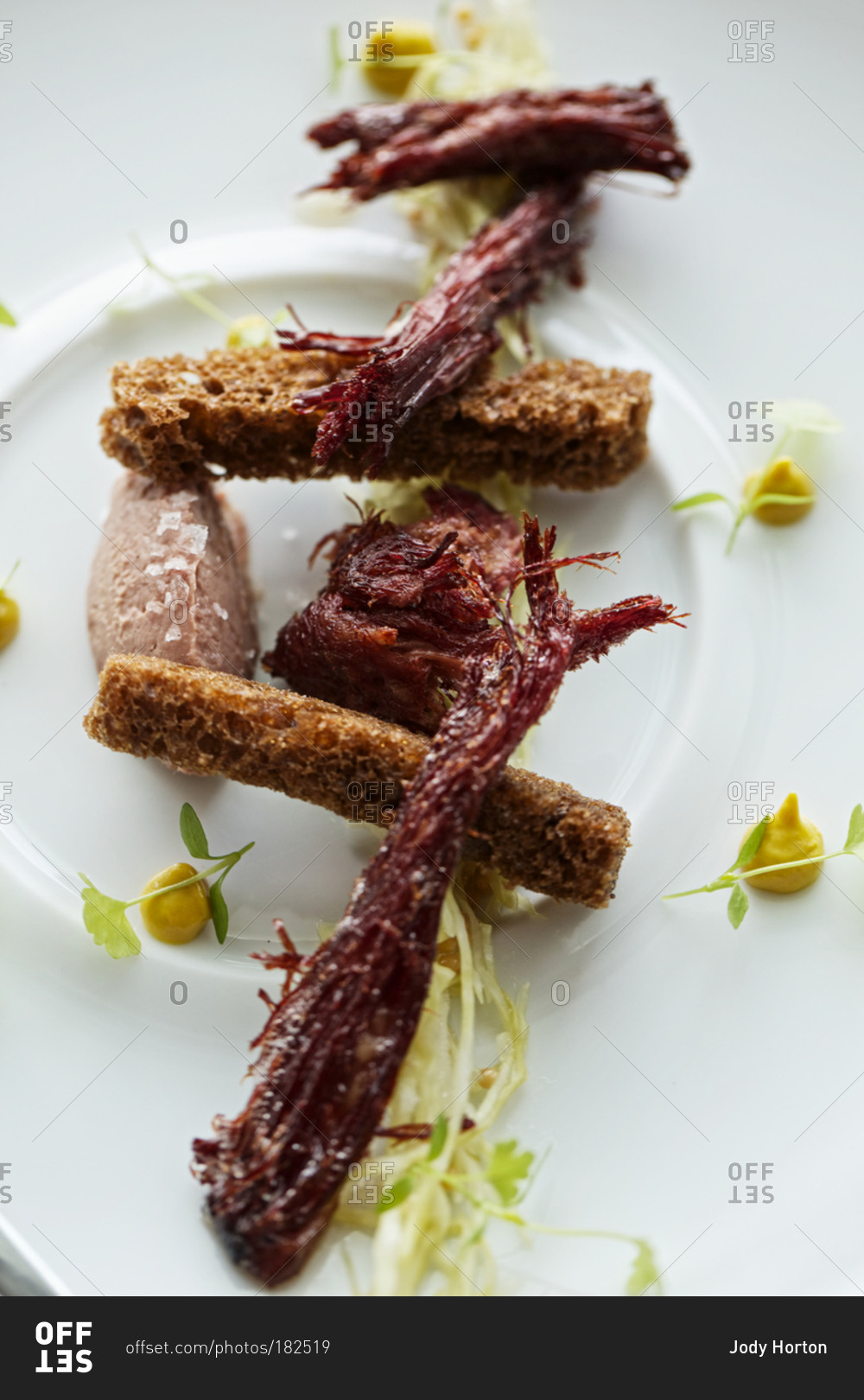 Wagyu beef tongue pastrami with breadsticks stock photo OFFSET