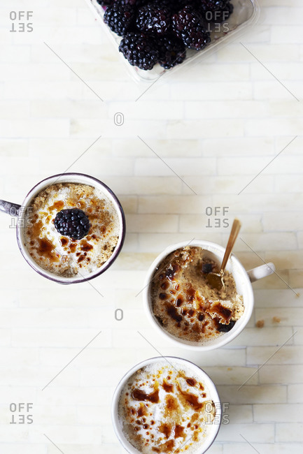 Rice pudding with caramelized sugar and blackberries