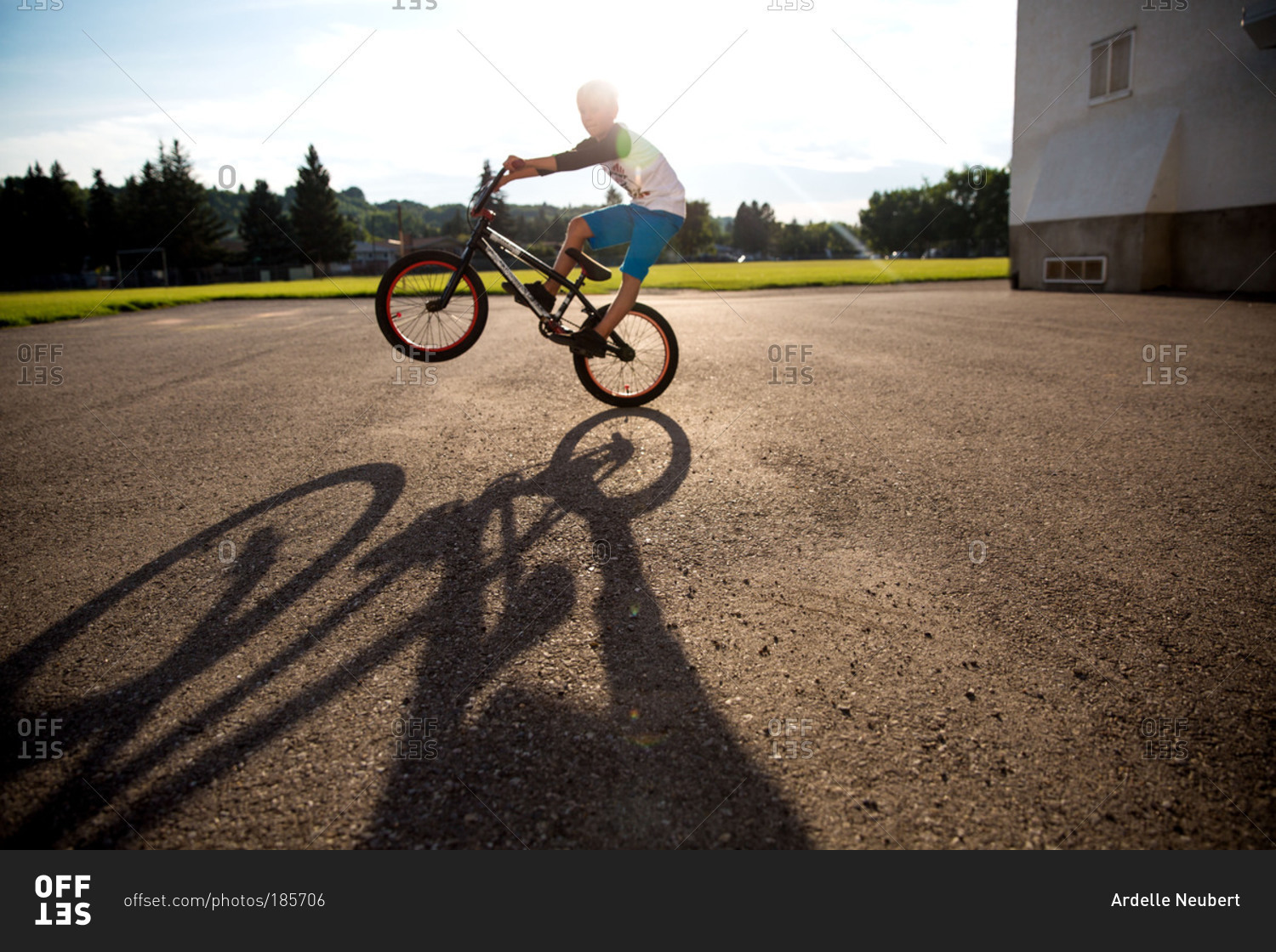 Boy riding his BMX bike