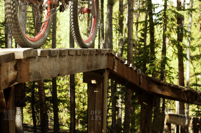 Close up of bicycle wheels on a track