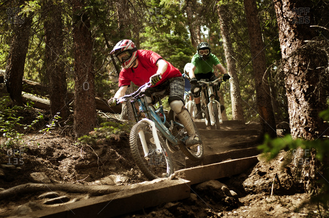 Bikers racing on an obstacle course