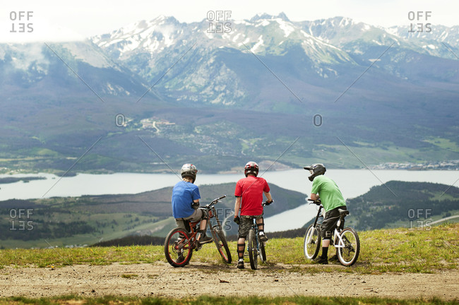 Three bikers taking a rest