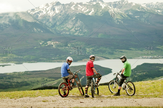 Mountain bikers with a mountain in the background