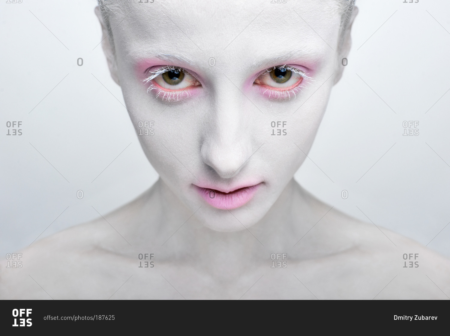 Portrait of a woman with white face painting stock photo - OFFSET