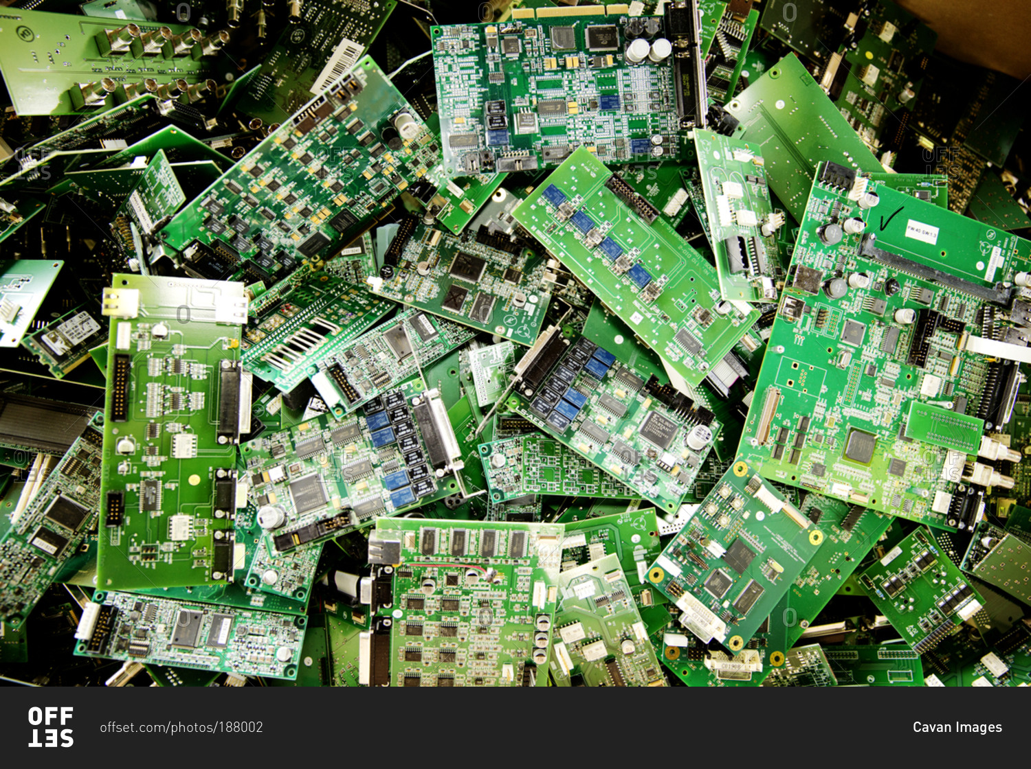 A pile of computer circuit boards prepared to be recycled